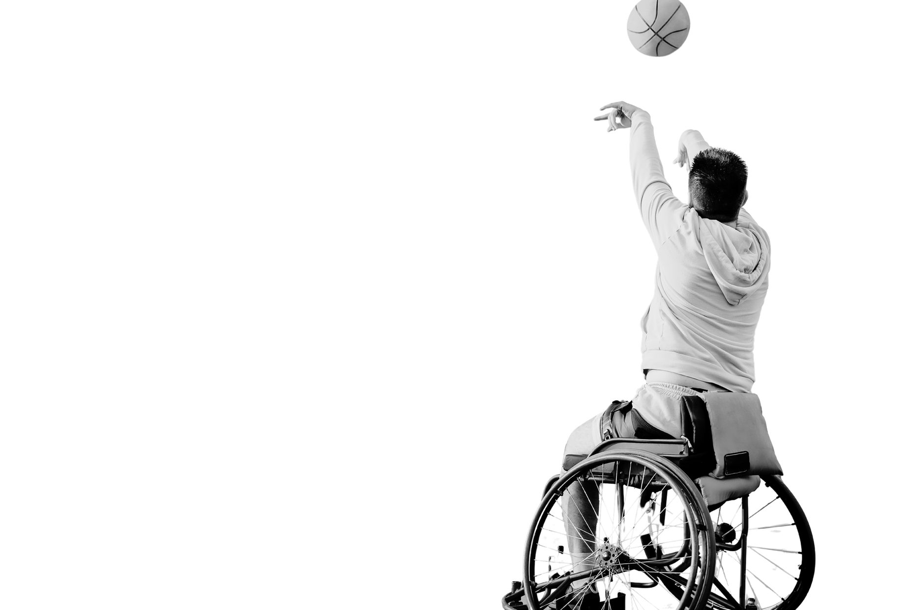 Wheelchair basketball player reaching for the ball